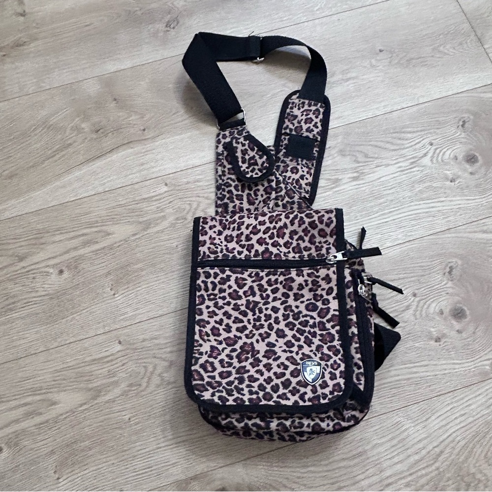 Heys cheetah print crossbody travel bag